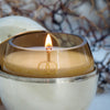 brass orb with scented candle