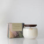 scented candle in glass jar with wooden cap sandalwood and river gum