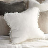 Ivory fringed linen cushion