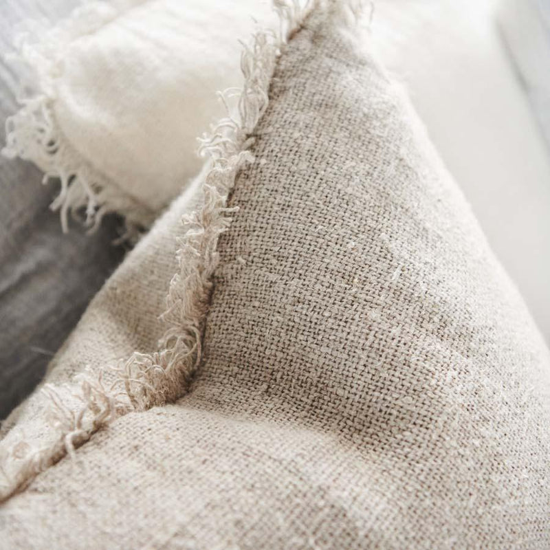 fringed linen cushion natural closeup
