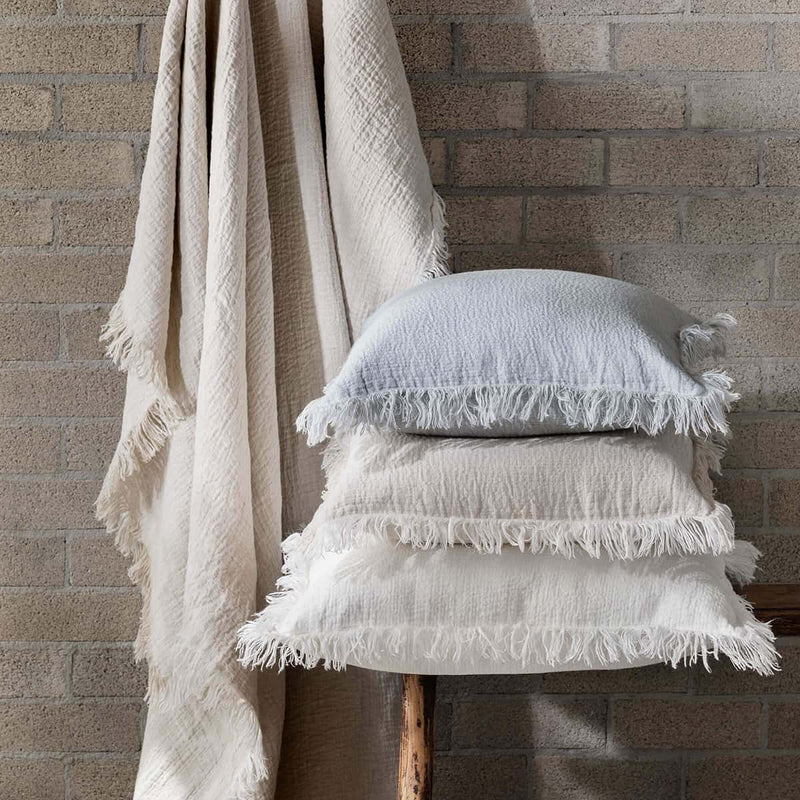 ivory crinkled linen cushion in stack